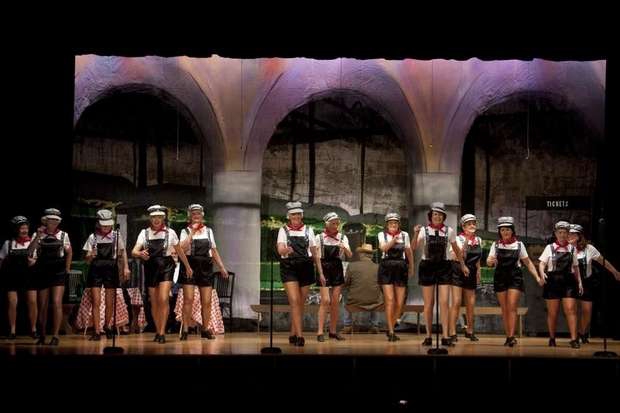 TNT_-_The_Rockerettes___Tuxedo_Junction__during_a_scene_that_mimics_a_busy_railroad_station_in_1936_April_12__2012.jpg
